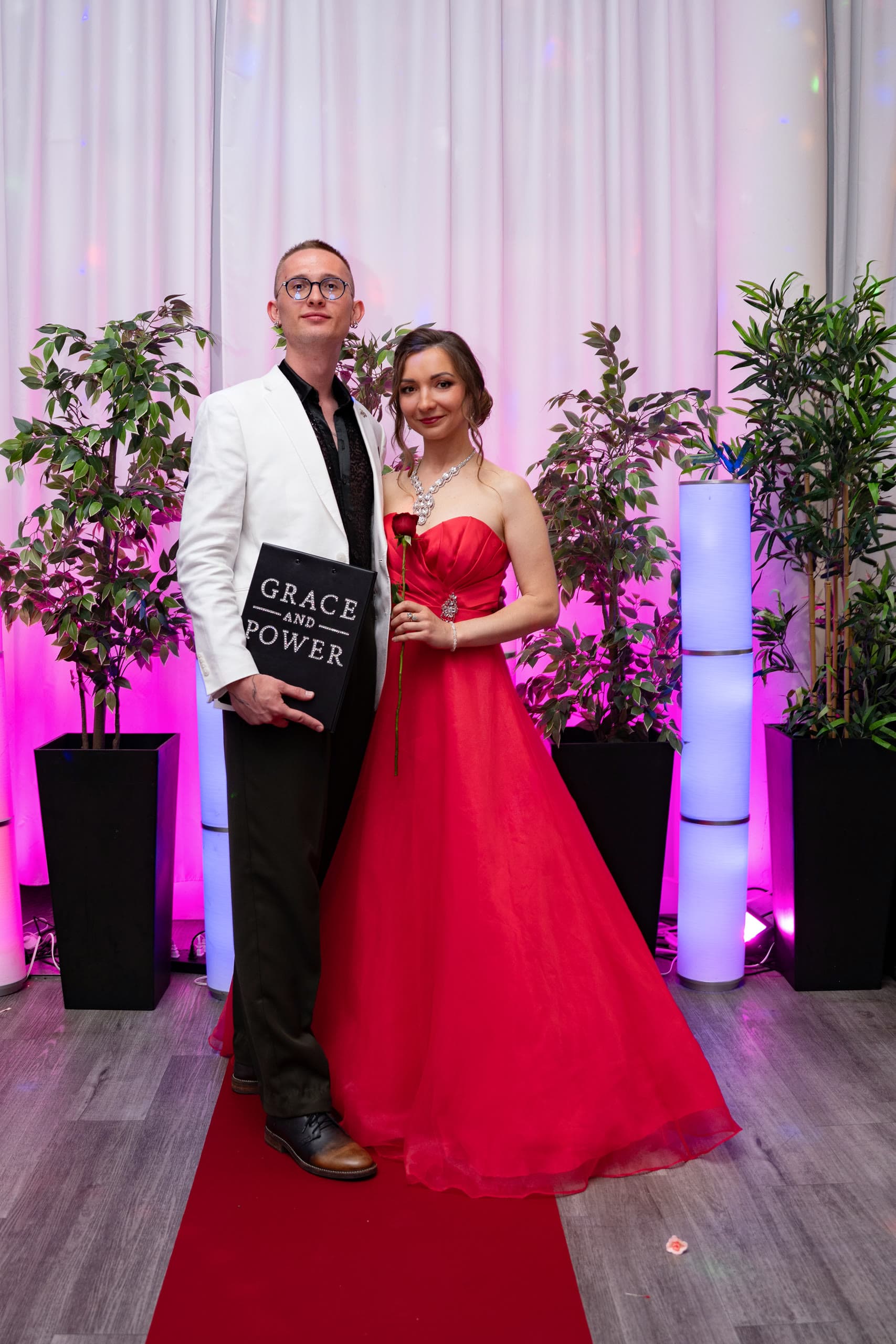 Anastasiia with the host at the Grace and Power event